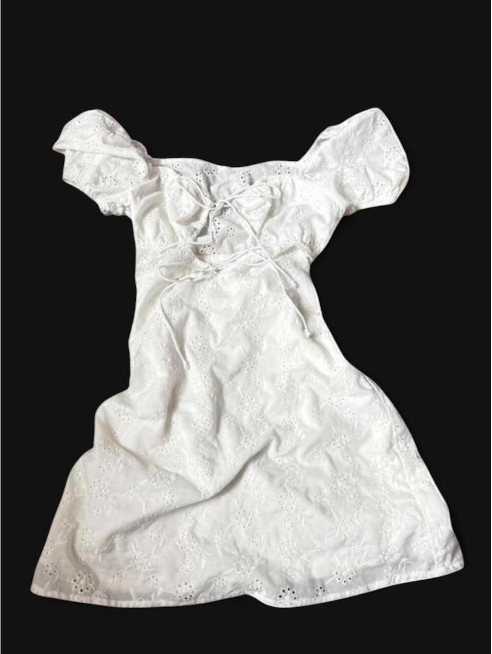 White eyelet mini dress with puffy sleeves and tie up front (double lined)